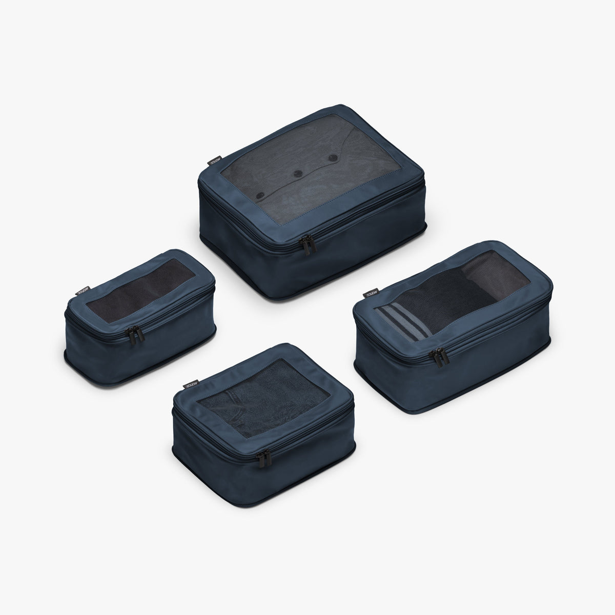 Set of Four / Arles Blue | This is a photo of a set of four compressible packing cubes in Arles Blue